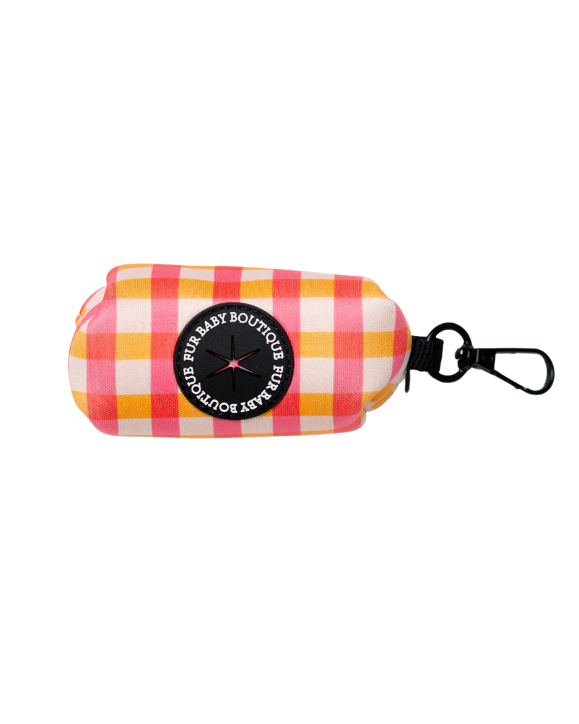 Checkered dog bag pouch with a clip on a white background